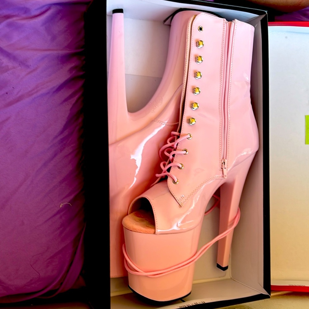 Pleaser heels, baby pink color with laces and zippers.Size 10 exotic dancer heel